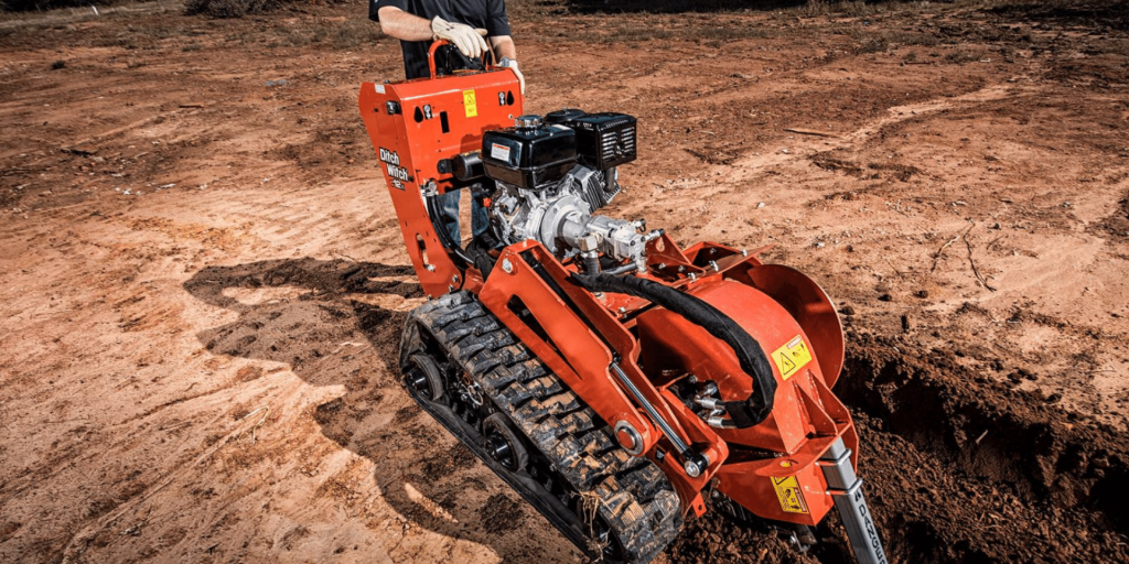 tracked walk behind trencher in action