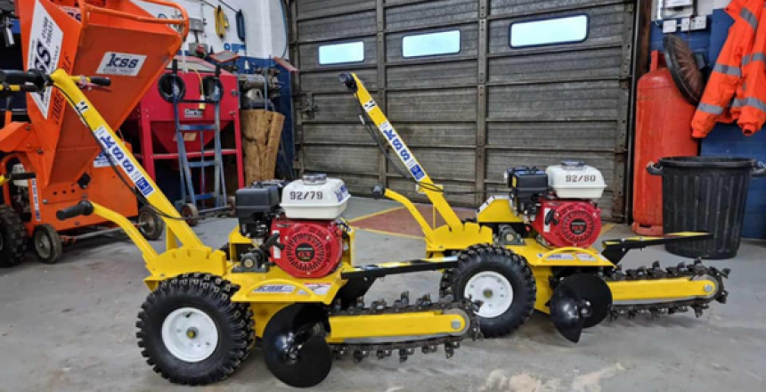 Two of our walk-behind trenchers parked in our workshop
